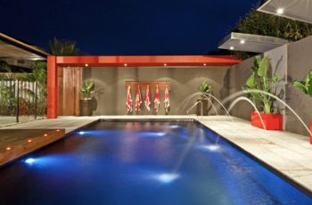 Compass Pools Melbourne Deckjet water feature around X trainer swimming pool